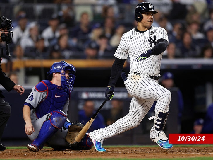 Juan Soto #22 of the New York Yankees hits a single during the fourth inning of Game Five of the 2024 World Series against the Los Angeles Dodgers at Yankee Stadium on October 30, 2024