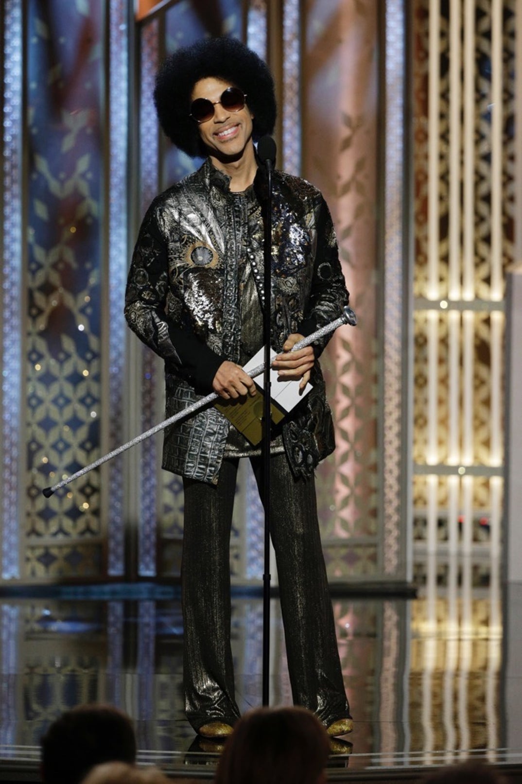 2015 -- Prince brought his A-game fashion and makes a surprise appearance to announce the best original song.