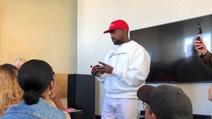 Kanye West Rocks MAGA Hat with Kaepernick Shirt
