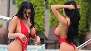 Playboy Model Becky Hudson Shows Off Curves in Tiny Red Swimsuit