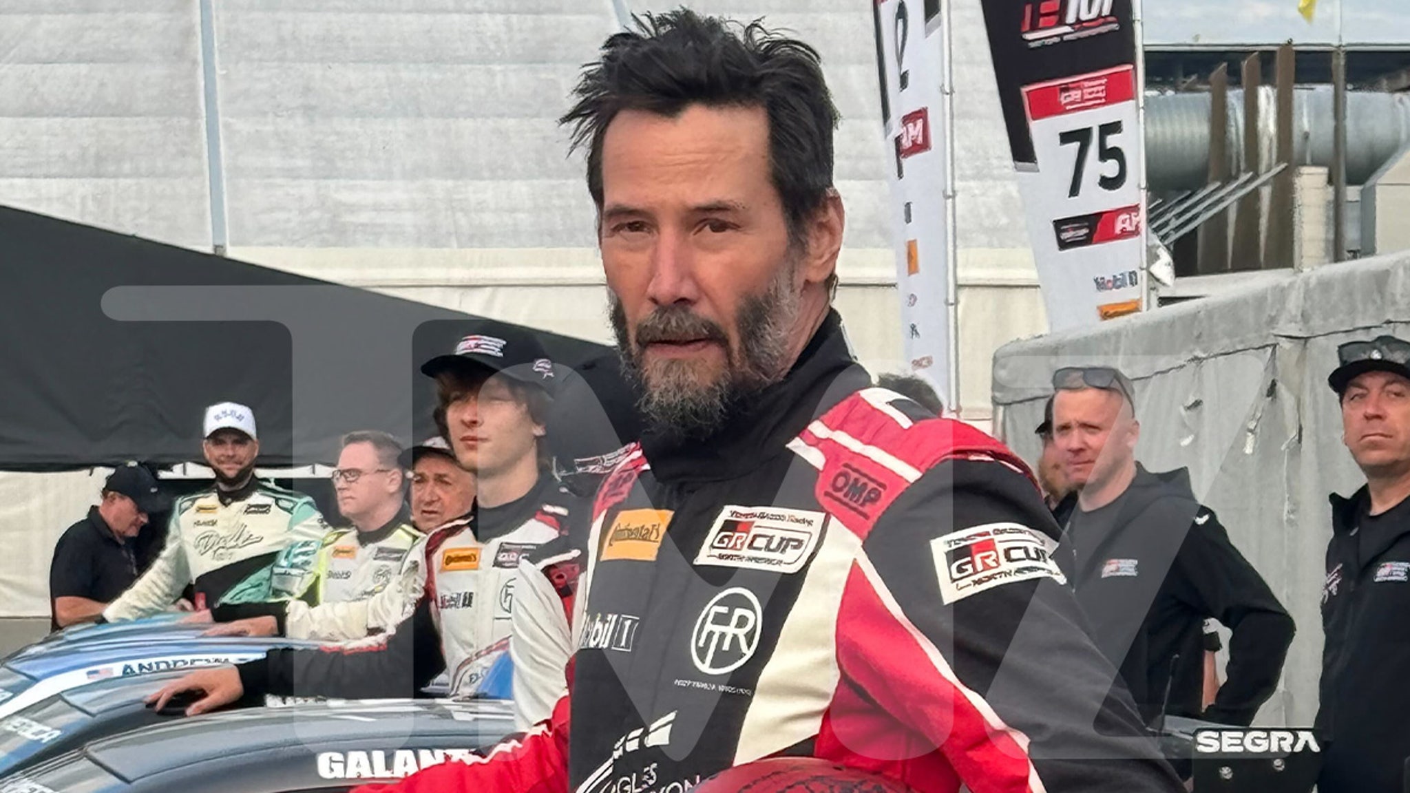 Keanu Reeves Looks Like a Badass Readying for Pro Auto Racing Debut