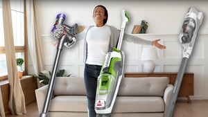Happy Woman Surrounded By Vacuums Available On Amazon