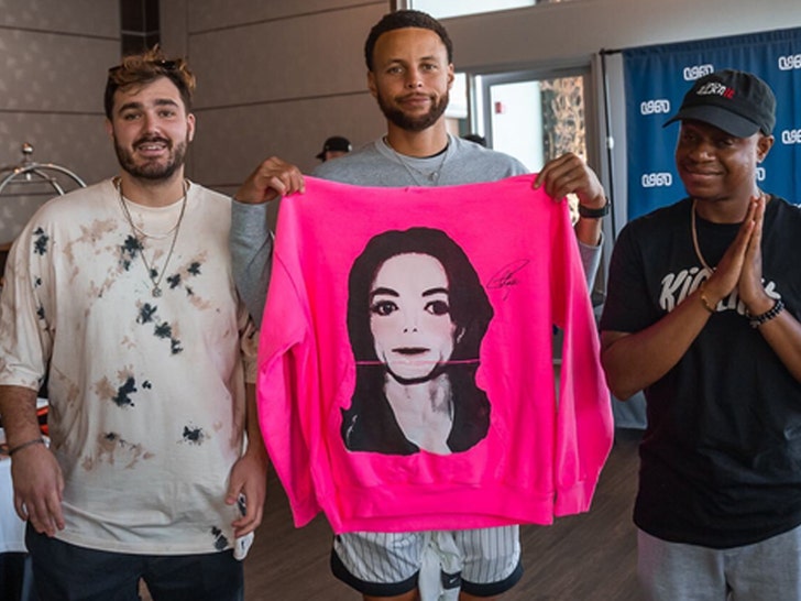Stephen Curry Signs Pete Davidson's Pink MJ Hoodie From Record-Breaking Game.jpg