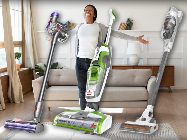 Happy woman surrounded by vacuum cleaners available on Amazon