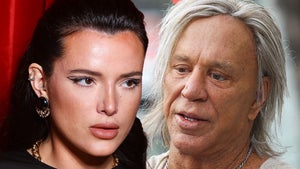 bella thorne Mickey Rourke faceing off getty