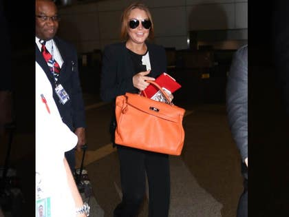 1217-lindsay-lohan-getty-airport-01