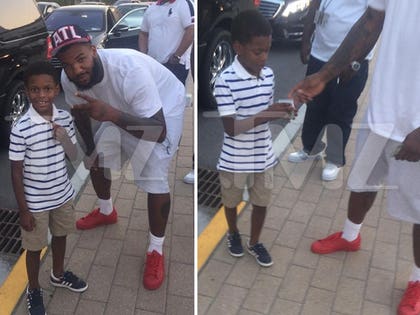 0511-MAIN-the-game-cash-gift-kid-TMZ-01