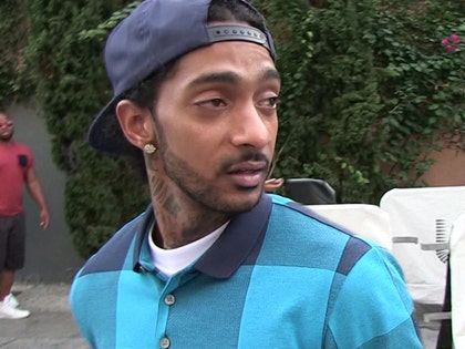 Nipsey Hussle's Hollywood Hills Gravesite Flooded with Flowers