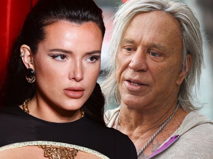 bella thorne Mickey Rourke faceing off getty