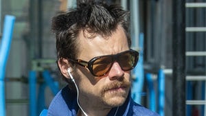 0402-Harry-Styles-Stache-In-London-PRIMARY