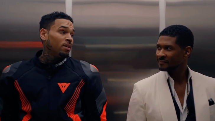 041026_chris_brown_usher_kal