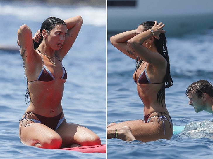 Dua Lipa Flaunts Bikini Body Doing Paddleboard Yoga