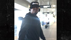 Marshawn Lynch Smacks Phone from Fan at LAX, Spits (VIDEO)