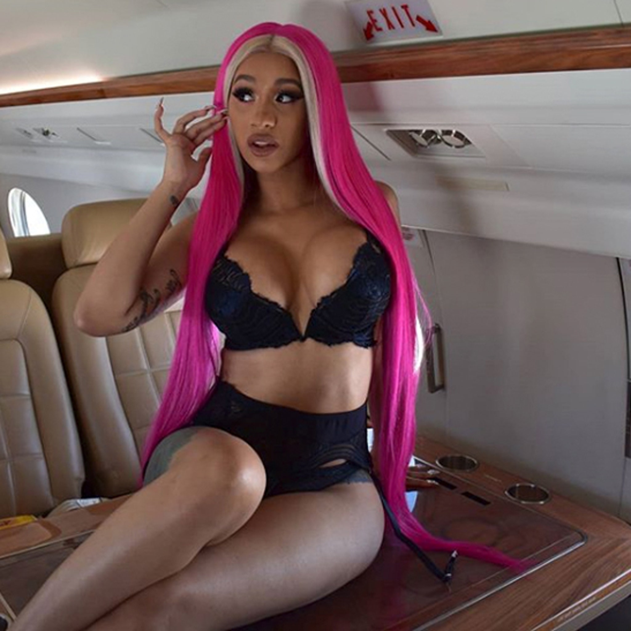 Cardi B Racy Lingerie Pic in Pink Wig on Private Jet