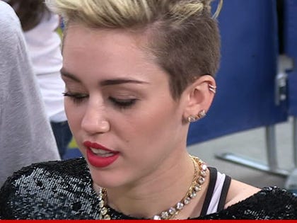 1224-miley-cyrus-tmz