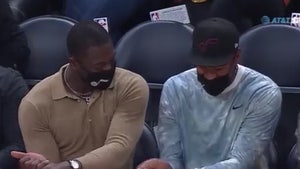 Dwyane Wade Gets Courtside Golf Lesson From Tony Finau At Jazz Game