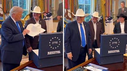 031426_trump_cowboy_hat_kal