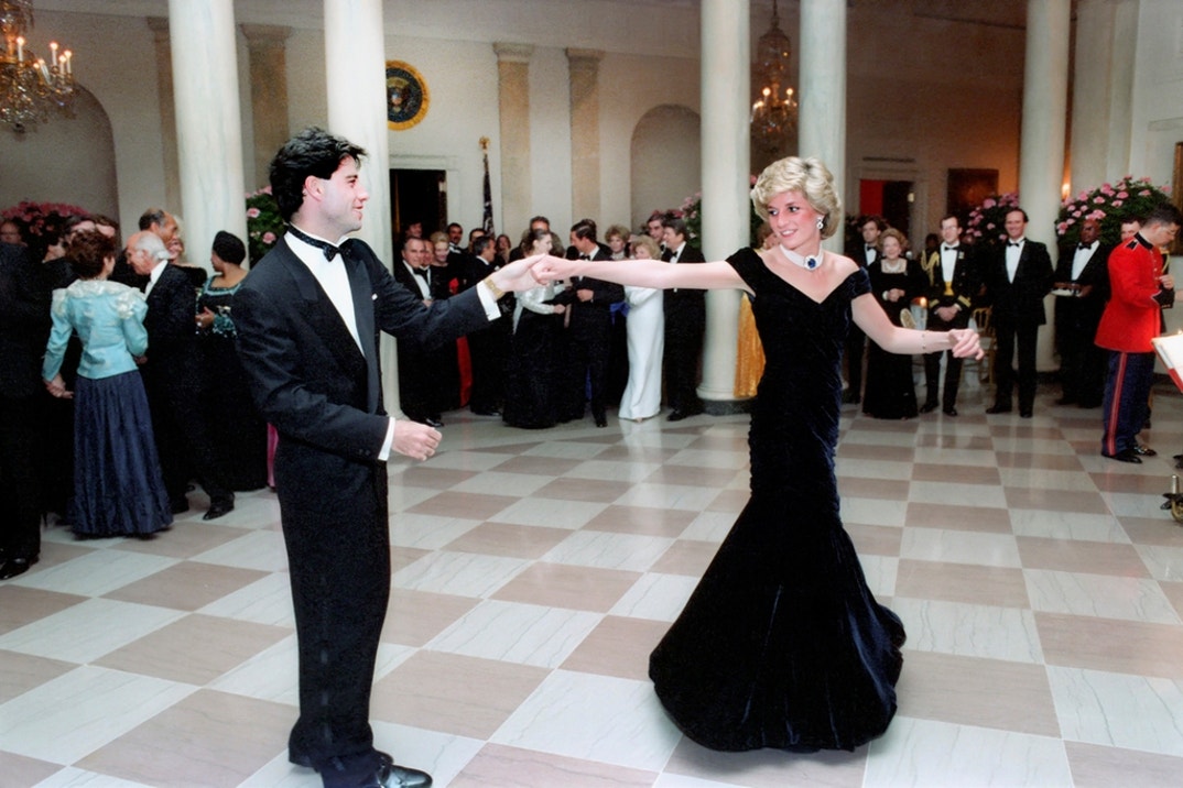 American actor John Travolta dancing with Princess Diana in Cross Hall of the White House, Washington, D.C., USA, President Ronald Reagan White House Photographic Office, November 9, 1985