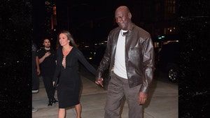 Michael Jordan Takes Hot Wife to Dinner In Rare $400 Air Jordans