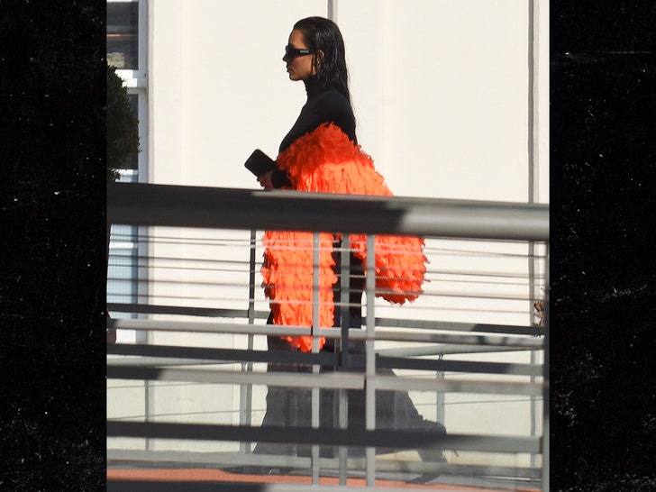 Kim Kardashian Sports Yellow Caution Tape for Balenciaga Show as