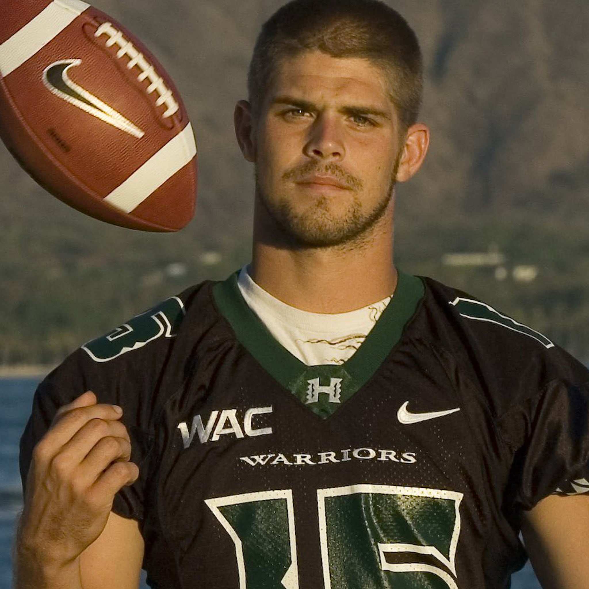 Quarterback Colt Brennan of the Washington Redskins rolls out