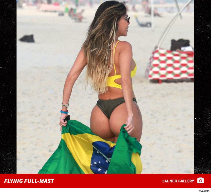 Liziane Gutierrez with the Brazilian Flag Flying Full-Mast