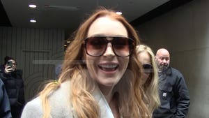 Lindsay Lohan Gets A-List Treatment on Movie Promo Tour, Signs Autographs