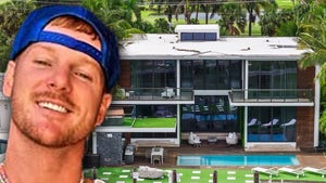 Sam Logan Next To His Miami Beach Home