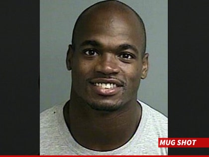 0913-adrian-peterson-mug-shot-03