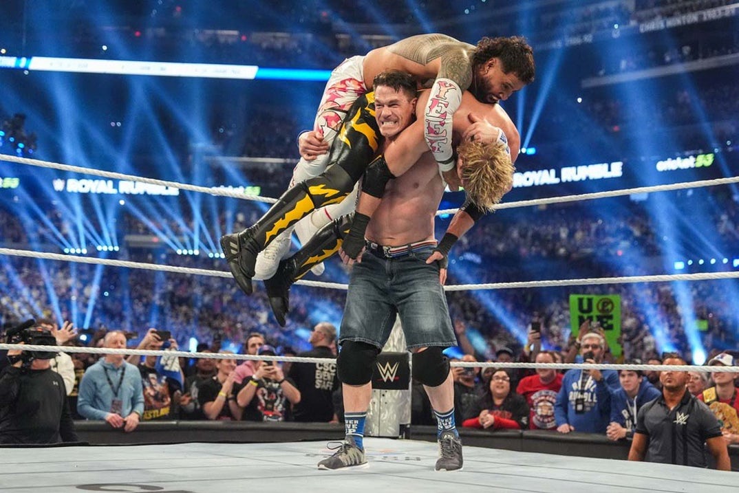 John Cena's strength is put to the test with Jey Uso and Logan Paul on his shoulders.