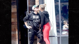Ryan Seacrest Kissing Girlfriend on West Coast Lunch Date