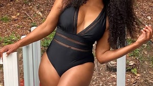 0828-Cynthia-Bailey-Black-One-Piece-HERO