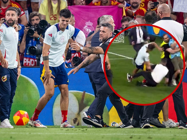Soccer Star Alvaro Morata Injured By Security Guard During Pitch Invader Chaos