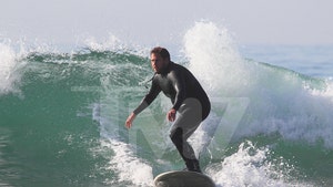 0215-jonah-hill-surfing-tmz-01