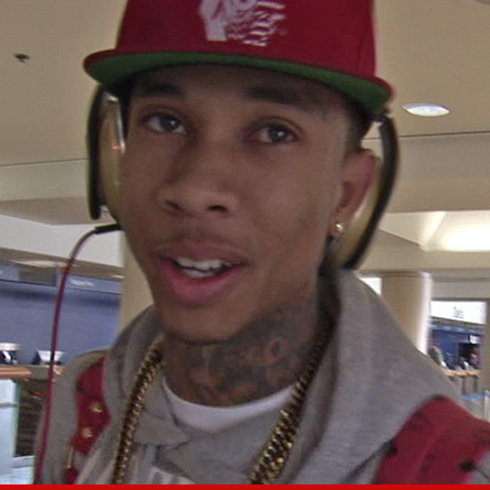 Tyga Rocks A Camouflage Louis Vuitton Jacket While Gassing Up His