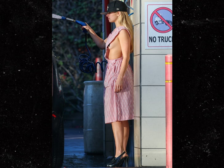 1202-Addison-Rae-Sideboob-Carwash-Saints-Hat-Photos-primary-3