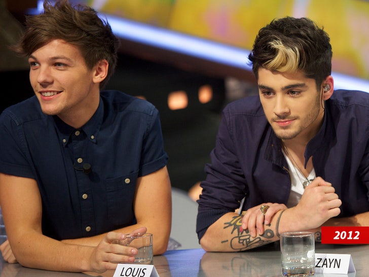 zayn malik louis tomlinson one direction sub getty swipe