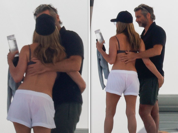 Jennifer Aniston and Jim Curtis Pack on PDA