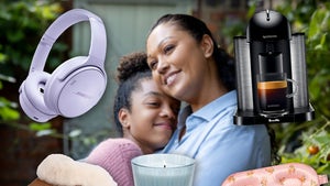 Mother And Daughter Hugging Surrounded By Gifts From Amazon