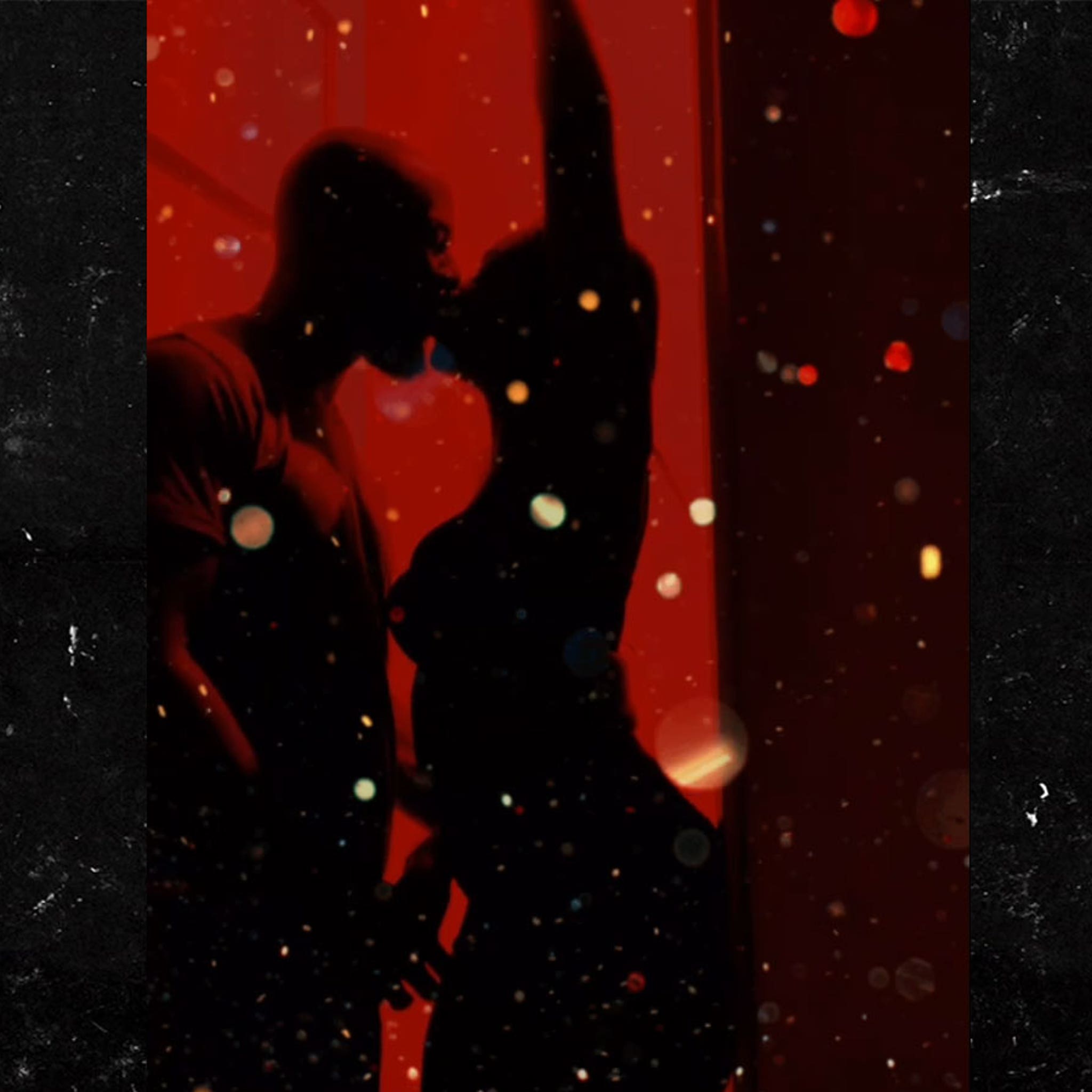 Tiffany Haddish Makes Out with Common in Steamy Silhouette Challenge