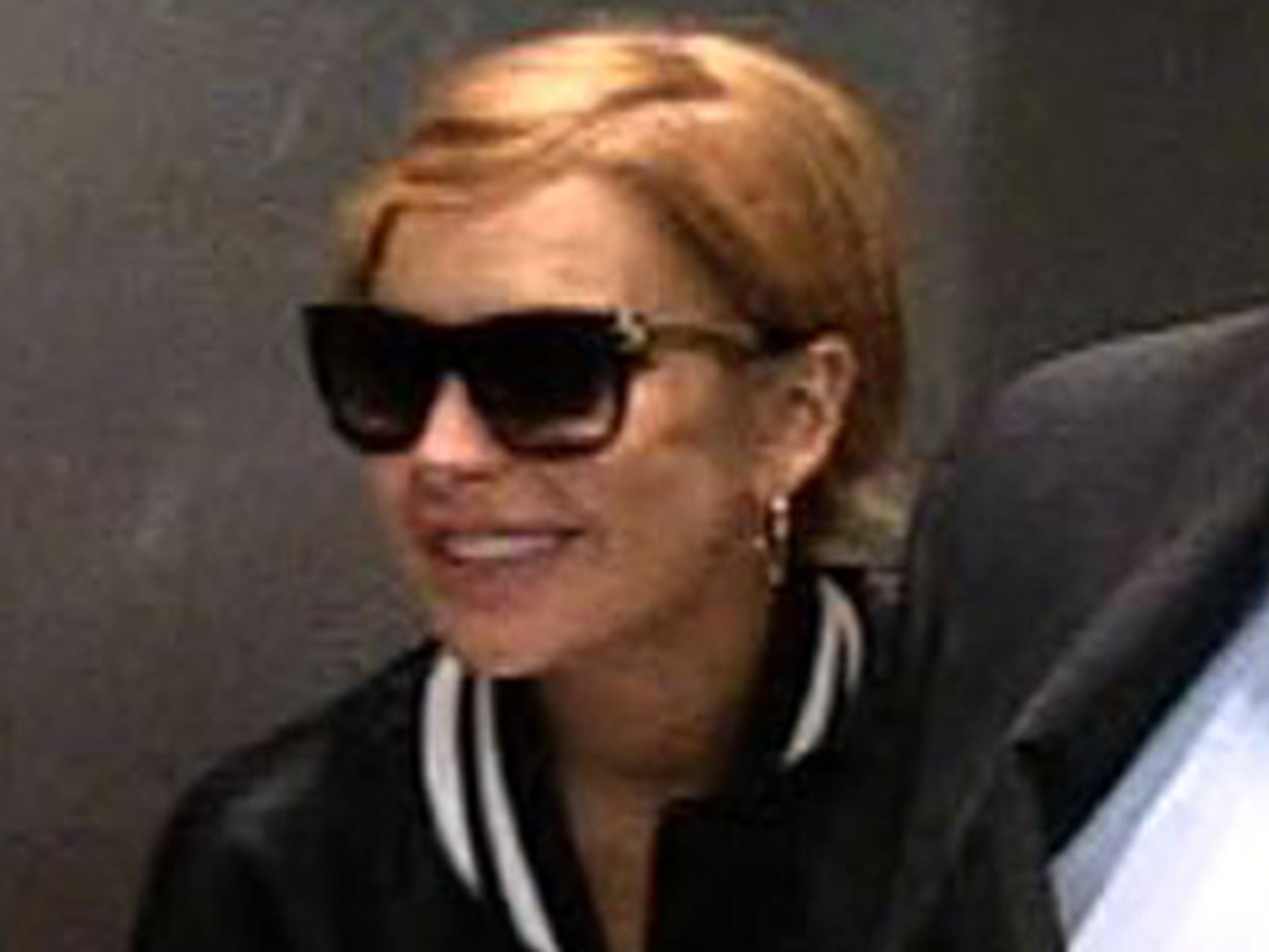 Lindsay Lohan -- Dude Smokes Her USED Cigarette!