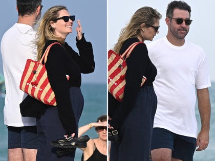 Kate Upton Standing On The Beach In Miami With Justin Verlander