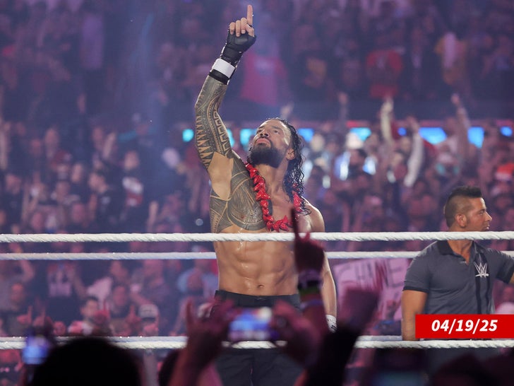 Roman Reigns yells during his Triple Threat match against CM Punk and Seth Rollins getty 2