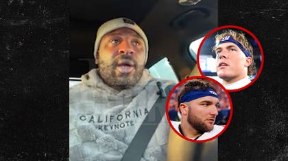 111125_brandon_jacobs_cam_jaxson_kal