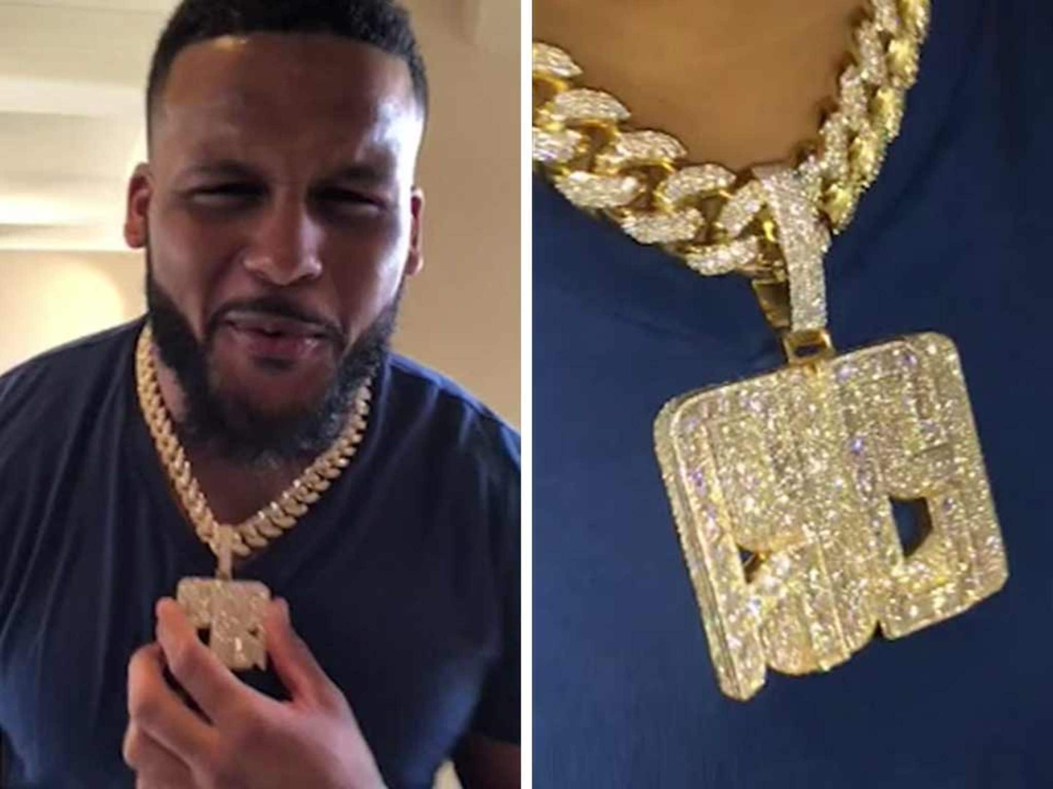 Rams' Powerhouse Aaron Donald Celebrates Big Contract With 'AD/99' Diamond  Pendant - Holder's Jewelers