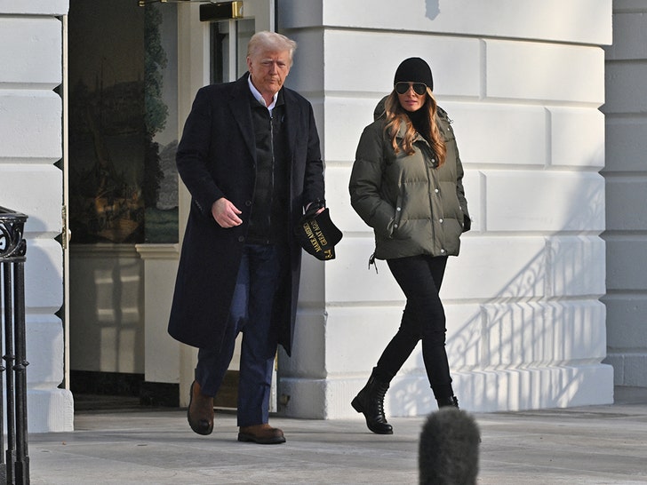 donald trump and melania walking to marine one chopper