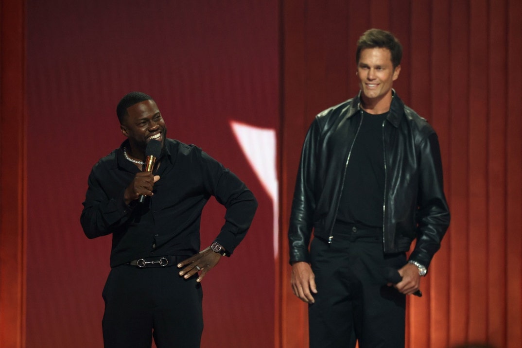 Kevin Hart and Tom Brady speak onstage during Netflix Is A Joke Festival