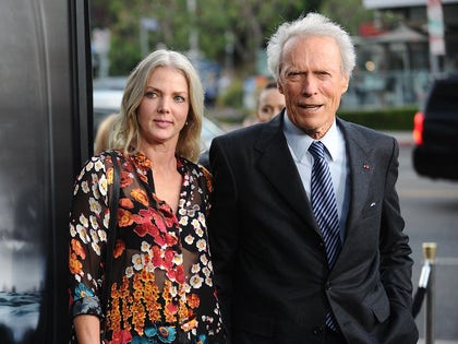 Clint Eastwood And Christina Sandera Posing For Photos Together 3