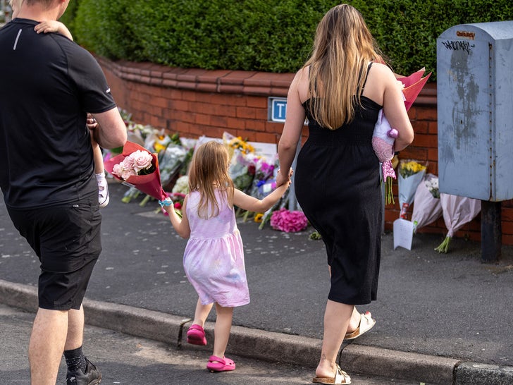 Flowers At Location Where Children Stabbed And Killed During Taylor Swift Theme Party