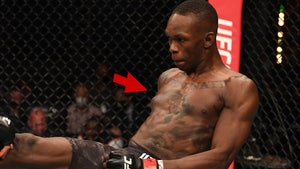 Israel Adesanya Blames Floppy Pec At UFC 253 On Weed, Doc Says I Smoke Too Much!